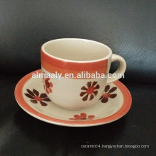 stoneware hand painted cup and saucer